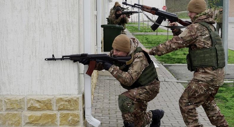 Chechen special forces troops take up firing positions as they attend a training session at a Russian University of Special Forces training centre in the town of Gudermes in Chechnya on December 13, 2022.STRINGER/AFP via Getty Images