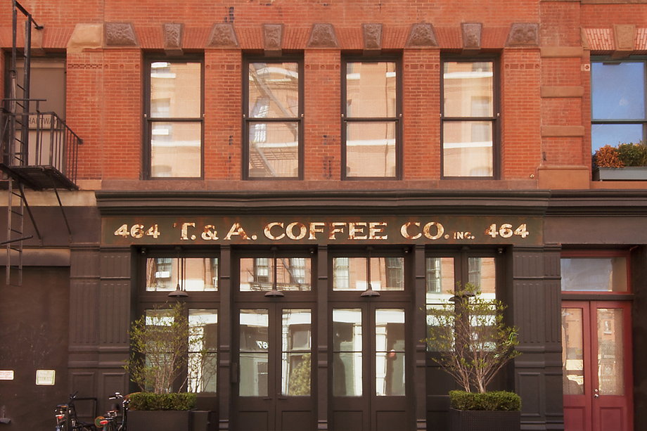 Built in 1892 for a wholesale coffee and tea merchant, the loft-style building still retains original details like the distinctive storefront signage.