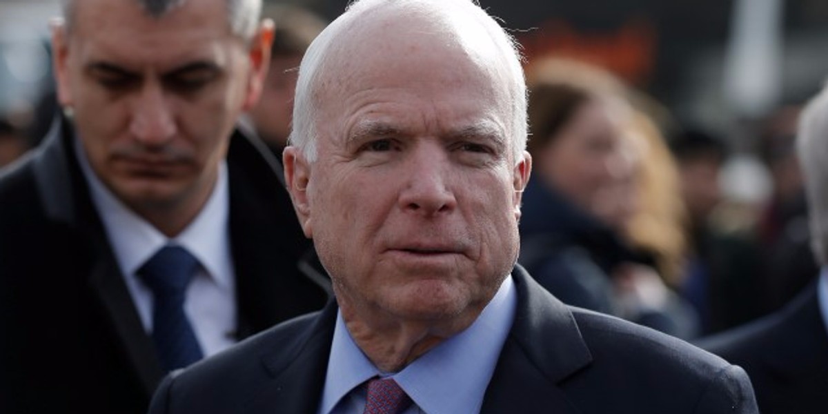 US Sen. John McCain on a visit at a migrant center near the village of Adasevci, Serbia.