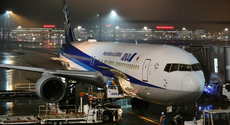 An ANA plane chartered by the Japanese government has gone to Wuhan to evacuate Japanese nationals from the epicentre of the China coronavirus outbreak -- here, the plane is seen before leaving Tokyo