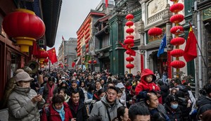 People in a pedestrian shopping street in Beijing, China.Kevin Frayer/Getty Images