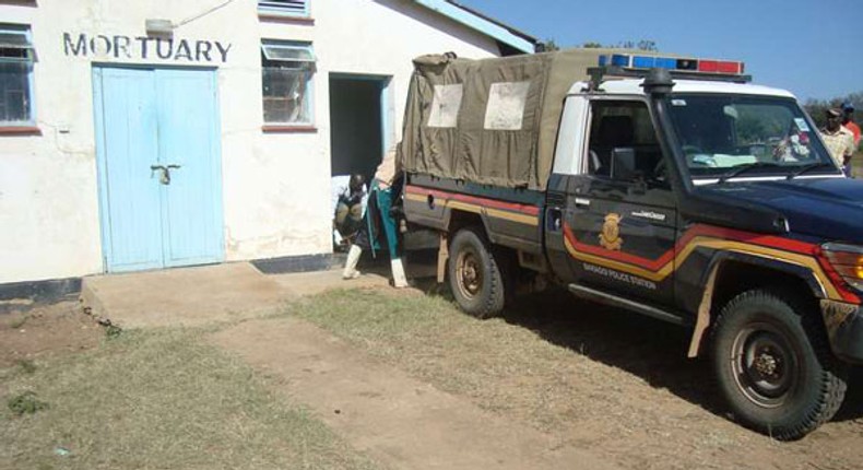 Police van outside a Mortuary