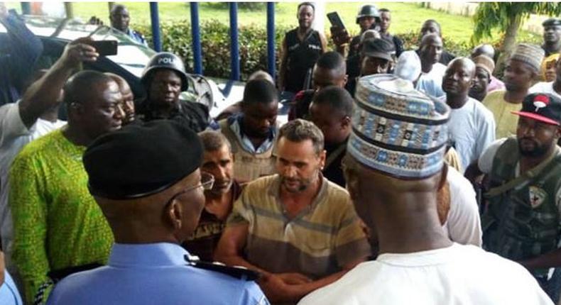 Police receive the four Turkish Nationals after thery were released by their captors (ChannelsTV)