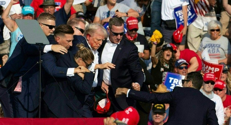 A bullet struck Trump's ear mid-speech, prompting Secret Service agents to converge on him and get him off the stage.REBECCA DROKE/Getty Images