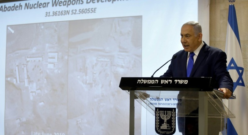 Israeli Prime Minister Benjamin Netanyahu shows to media what he says is evidence of a secret Iranian nuclear site