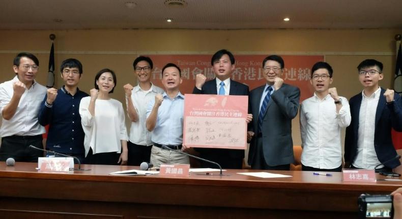 Lawmakers in Taiwan launched a new group to help promote democracy in Hong Kong on Monday, a move likely to rile Beijing ahead of the 20th anniversary of the handover of the city from Britain back to China.