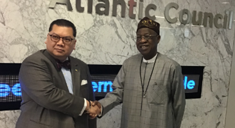 Mr Peter Pham, the Deputy President Think Tank of the Atlantic Council and Alhaji Lai Mohammed, the Minister Of Information and Culture, at the Atlantic Council Office in Washington, USA [nan]