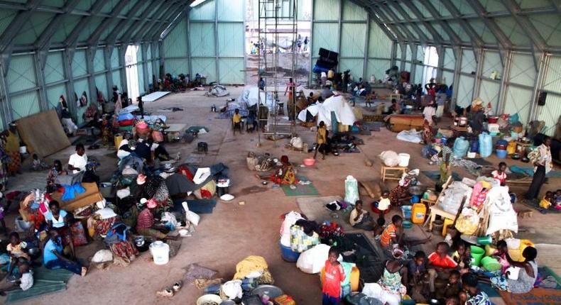 Refugees sit on the floor at a camp for internally displaced people in Kaga Bandoro, Central African Republic, in October 2016