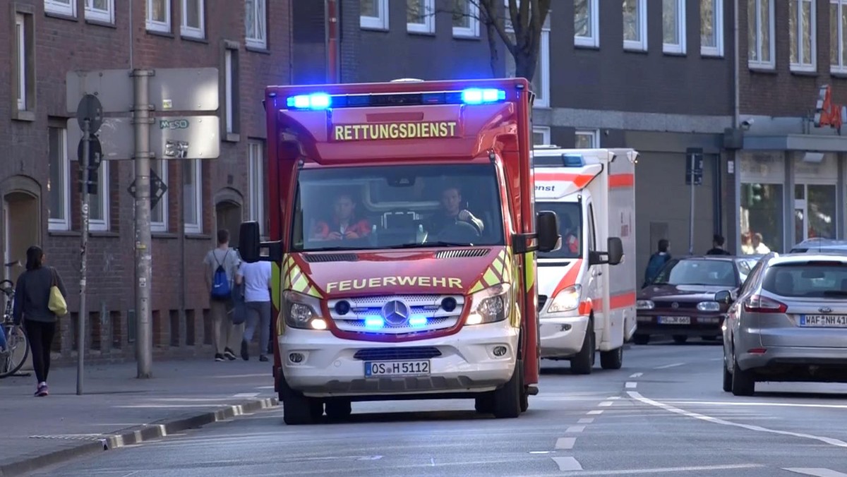 An ambulance arrive near a place where a vehicle drove into a group of people killing several and injured many in Muenster