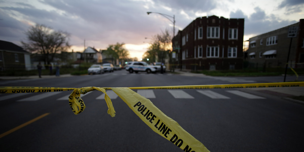 Police crime tape displayed at the scene where a 16-year-old boy was fatally shot in the head and another 18-year-old man was wounded by gunfire on the 7300 block of South Sangamon Street on April 25 in Chicago.