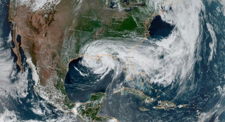 This satellite image obtained from NOAA/RAMMB, shows Tropical Storm Cristobal just south of New Orleans at 19:50 UTC on June 7, 2020, as it moves northward at 12 miles per hour (19 kph)