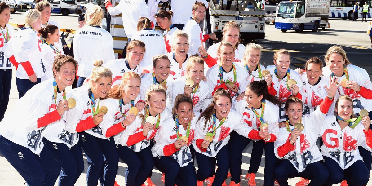 British athletes show off their Olympic medals.