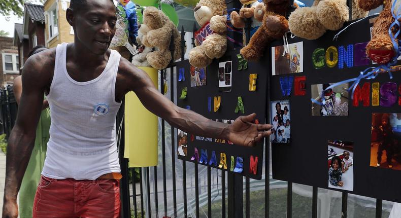 Antonio Brown, father of 7-year-old Amari Brown, speaks with the media after his son was fatally shot in Chicago, July 6, 2015.