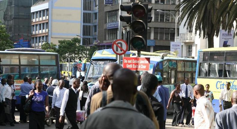 Kenyans on a busy Nairobi street. Mobile loan app services have come up with a new strategy to compel defaulters to pay up their loans