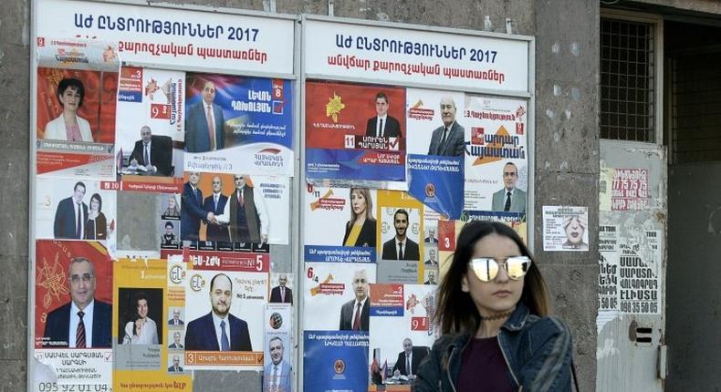 Election posters in Yerevan, where Armenians are voting in landmark legislative polls for the first time since the adoption of constitutional reforms aimed at transforming the ex-Soviet country into a parliamentary republic