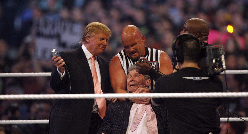 Donald Trump shaving Vince McMahon's head at WrestleMania 23 in 2007.