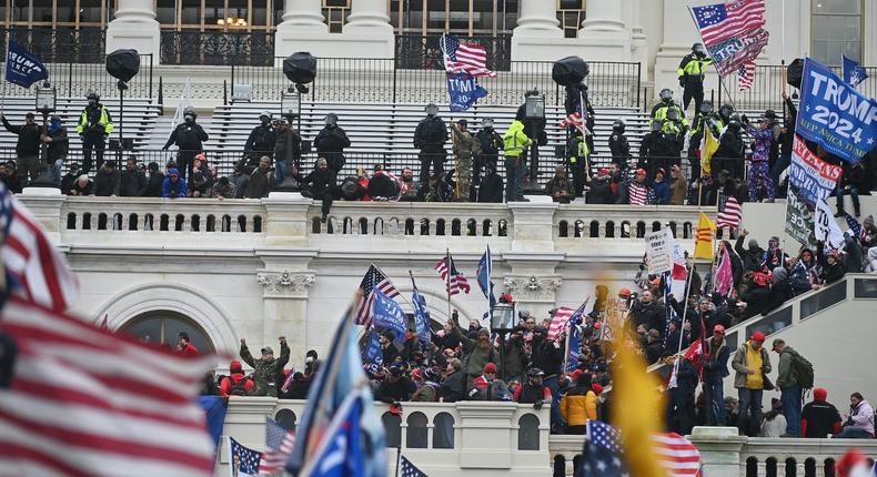 Supporters of President Donald Trump take over balconies and inauguration scaffolding at the United States Capitol on Wednesday, January 6, 2021 in Washington, DC. Matt McClain/The Washington