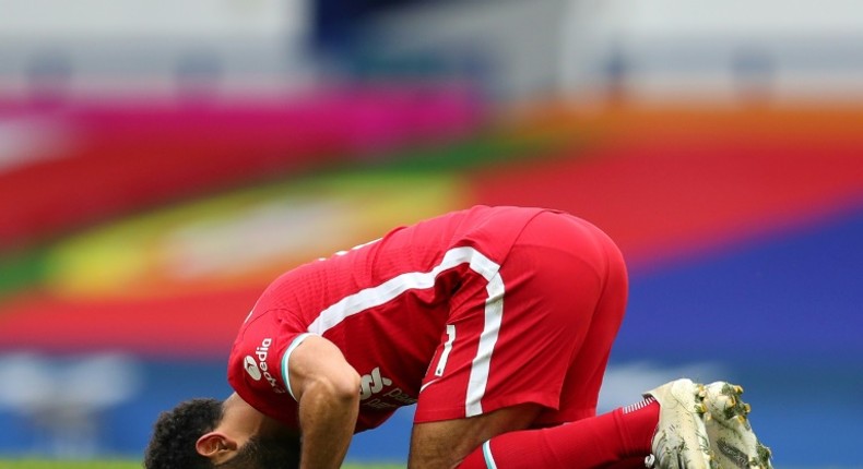 Egyptian Mohamed Salah celebrates his 100th Liverpool goal