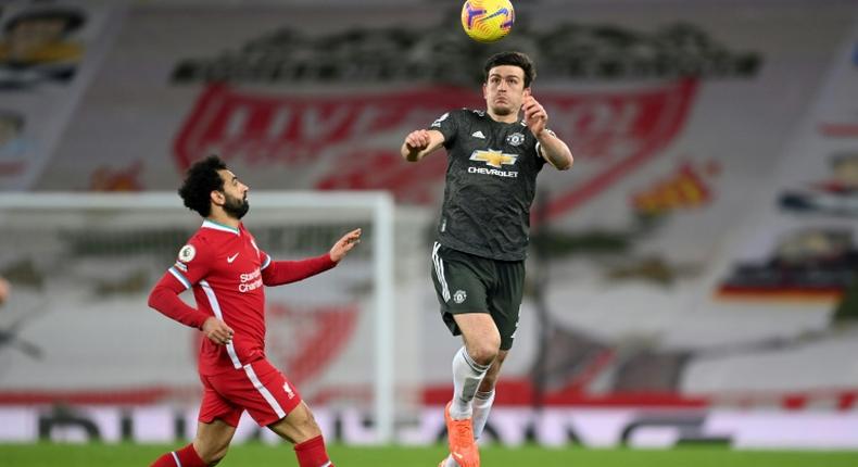 Heading in the right direction: Harry Maguire (right) sees huge progress in his 18 months at Manchester United