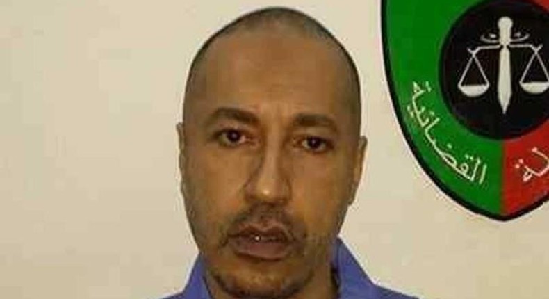 Saadi Gaddafi, son of Muammar Gaddafi, looks on inside a prison in Tripoli in this handout photograph provided by the prison's relations department on March 6, 2014.  REUTERS/Prison Media Office/Handout via Reuters