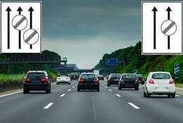Biały znak ze strzałkami i okręgami na niemieckiej autostradzie — co oznacza?