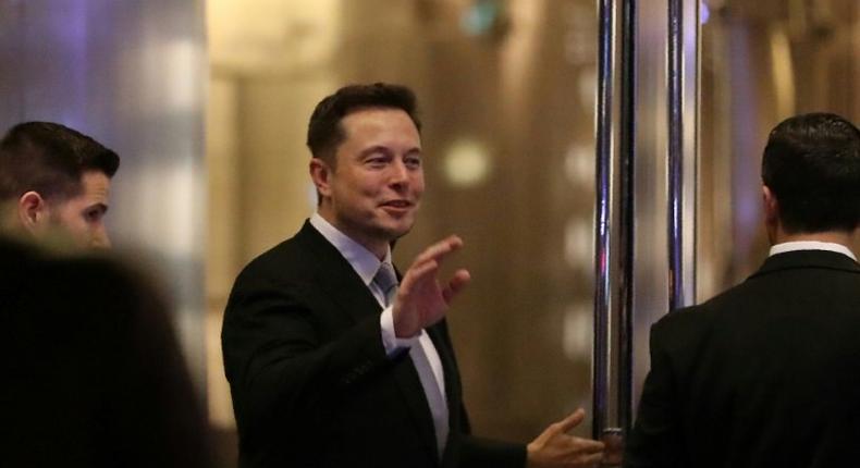 Elon Musk, founder and chief executive of electric carmaker Tesla, seen at a ceremony in Dubai in February, said he would quite President Donald Trump's advisory panels if Washington pulls out of the Paris global climate agreement