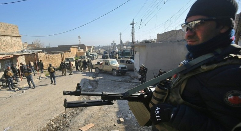 Iraqi forces are deployed in the village of al-Buseif, south of Mosul, during an offensive to retake the western side of the city from Islamic State (IS) group fighters on February 21, 2017