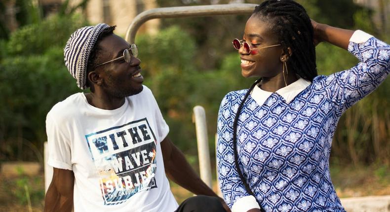 Photograph of a couple looking at each other while smiling [Image: Kwaku Griffin]