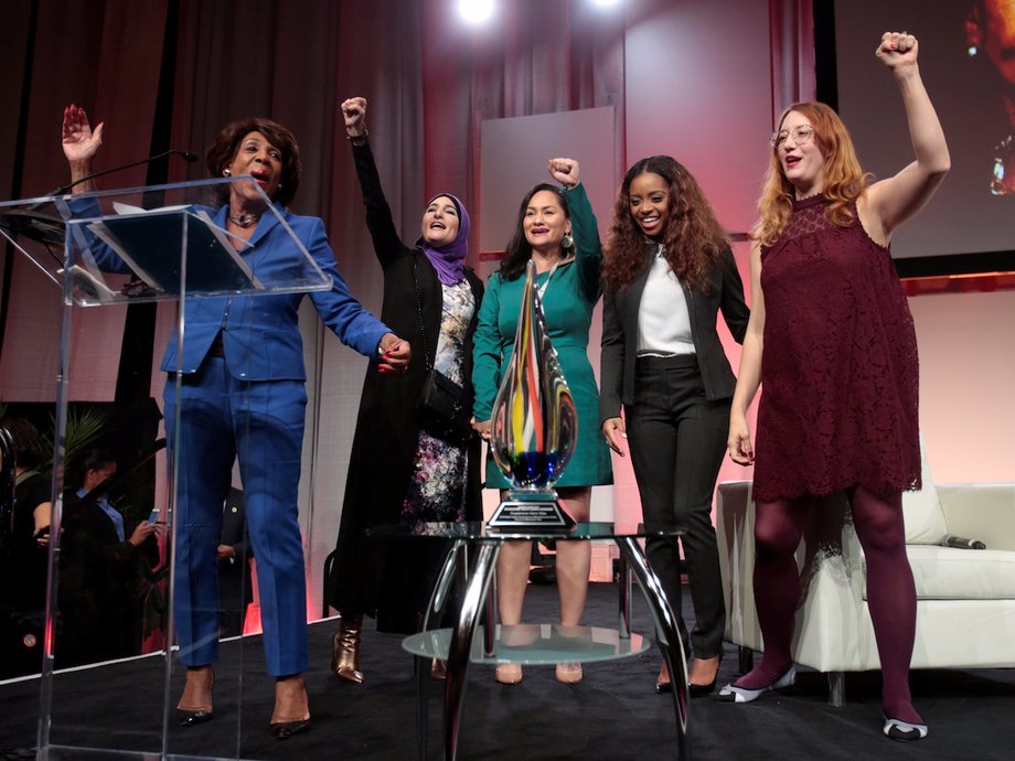 Rep. Maxine Waters speaks at the October Women's Convention with the national Women's March co-chairs.