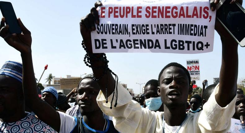 Lors d’une manifestation demandant la criminalisation de l’homosexualité, à Dakar, le 23 mai 2021 SEYLLOU - AFP