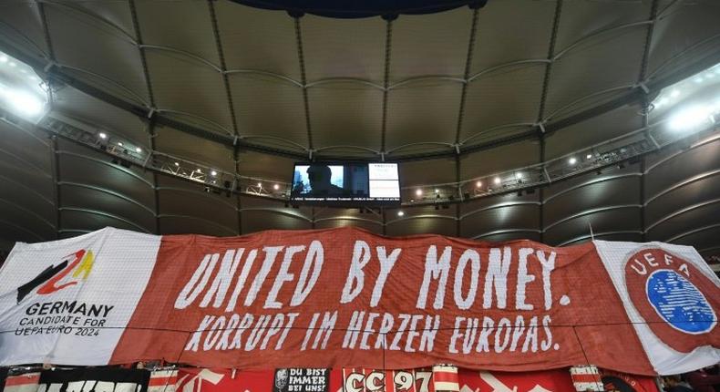 Stuttgart's supporters displayed a giant banner reading United by money, corrupt in the heart of Europe to protest against Germany's bid to host the Euro 2024 finals with UEFA set to announce the host nation on Thursday.