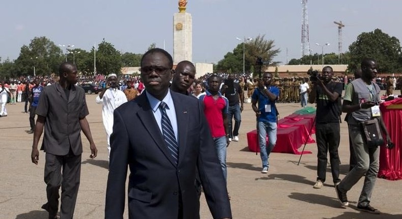 Burkina Faso interim President Michel Kafando attends an official funeral service for victims of the failed military coup in the Place de la Revolution in Ouagadougou, Burkina Faso, October 9, 2015. REUTERS/Arnaud Brunet