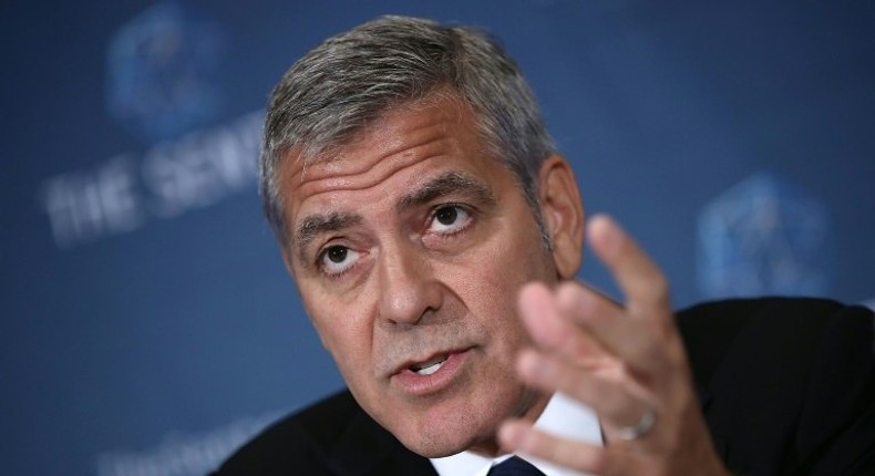 Actor George Clooney answers questions during a press conference about corruption in South Sudan at the National Press Club on September 12, 2016 in Washington, DC