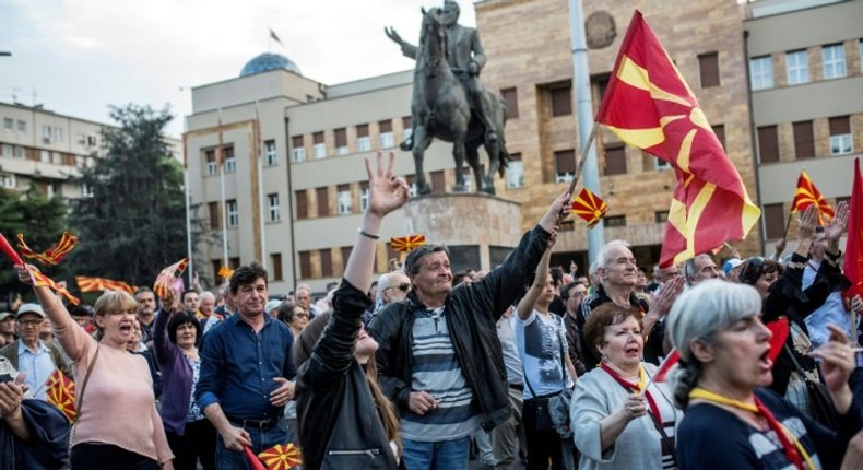 Protesters demonstrate in front of the Parliament building in Skopje on May 2, 2017, a few days after violence erupted after nationalist protesters stormed the building in anger over a vote for a new speaker