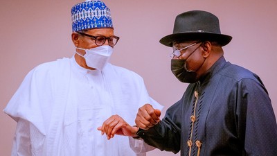 President Muhammadu Buhari (left) with former President Goodluck Jonathan (right) [Presidency]