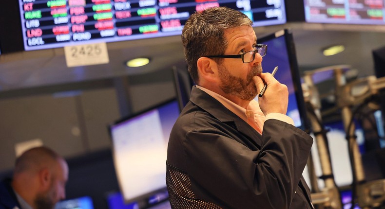 Traders work the floor of the New York Stock Exchange during morning trading on May 05, 2022 in New York City.