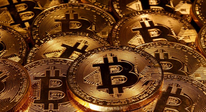 FILE PHOTO: Representations of virtual currency Bitcoin are seen in this picture illustration taken taken March 13, 2020. REUTERS/Dado Ruvic/Illustration