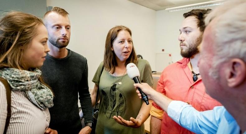 Donor children speak to reporters at a court in Rotterdam on June 2, 2017