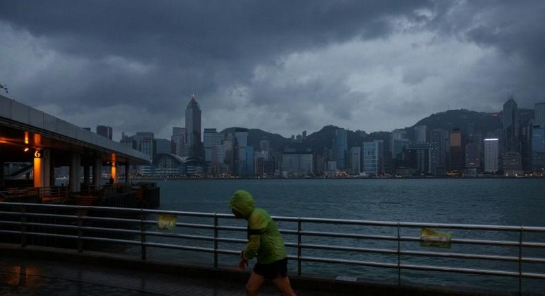 More than 200 flights have been axed in and out of Hong Kong, with schools and offices also shut as the typhoon looms.