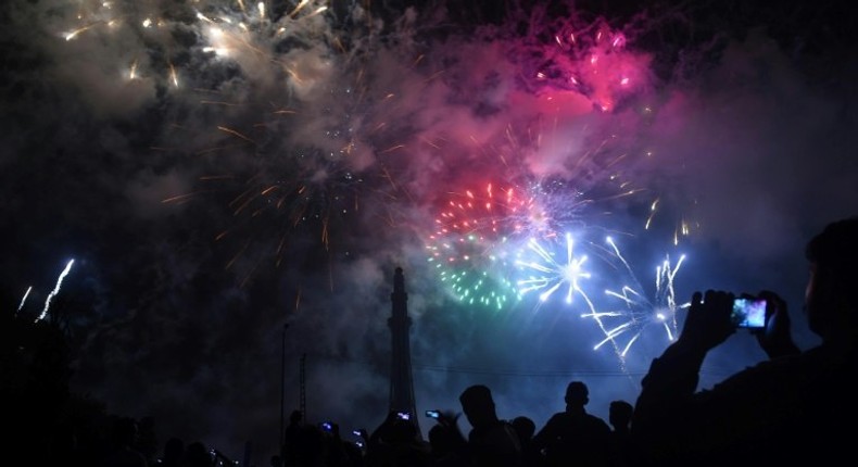 People watch fireworks in Lahore to celebrate Pakistan's Independence Day on the 70th anniversary of the country's creation