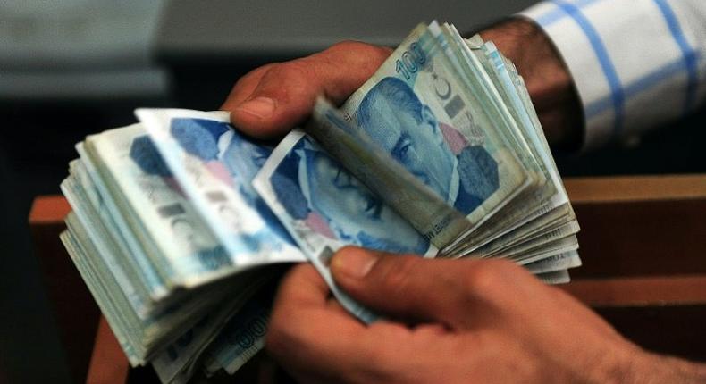The Turkish lira was trading at 3.17 to the dollar, a new historic low and a loss in value of 1.8 percent on the day