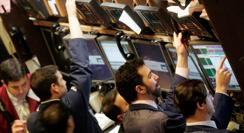 Traders work on the main trading floor of the New York Stock Exchange March 21, 2007.
