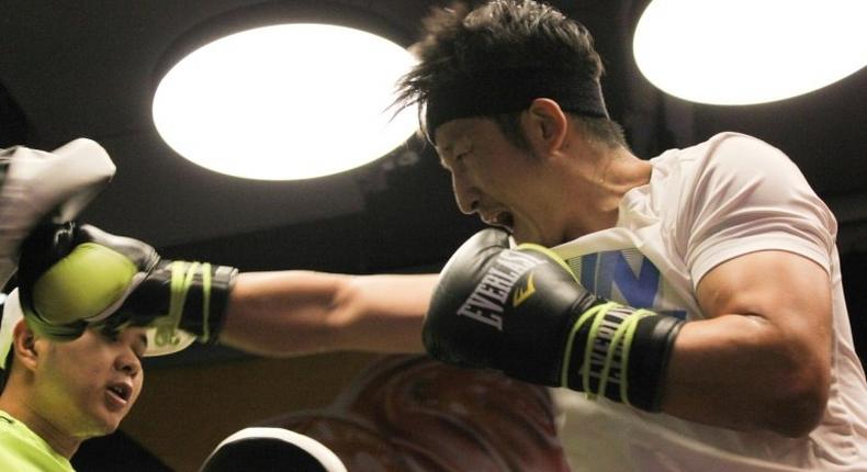 Chinese boxer Zou Shiming trains at a gym in Shanghai