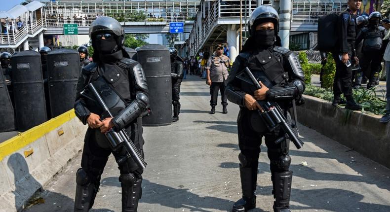 Peaceful protests against president Joko Widodo's re-election erupted into street battles between police and rioters in central Jakarta