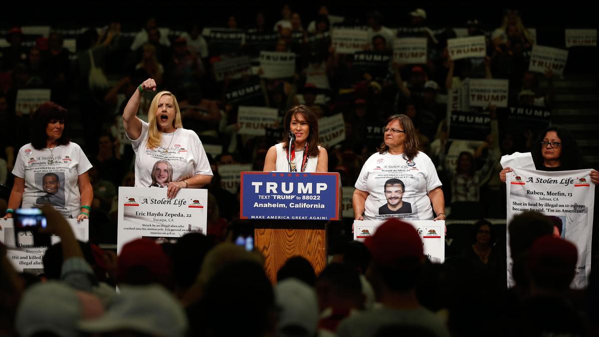 Women representing Stolen Lives families take part in a Trump rally in Anaheim