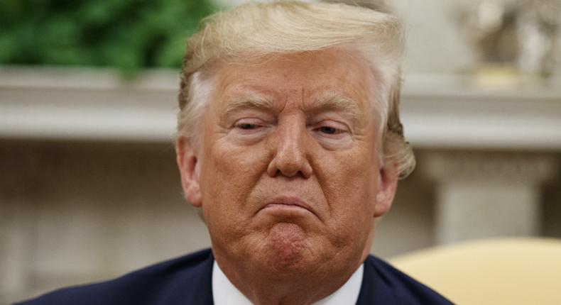 President Donald Trump pauses while speaking during a meeting with Romanian President Klaus Iohannis in the Oval Office of the White House, Tuesday, Aug. 20, 2019, in Washington. (AP Photo/Alex Brandon)