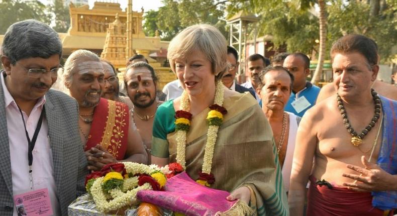 Britain's Prime Minister, Theresa May (R) is on a charm ofensive in Bangalore, India's tech on November 8, 2016