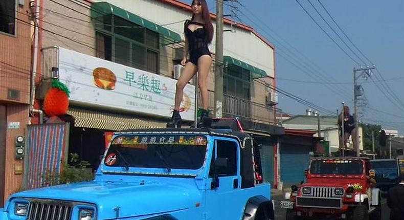 Strippers at a funeral procession