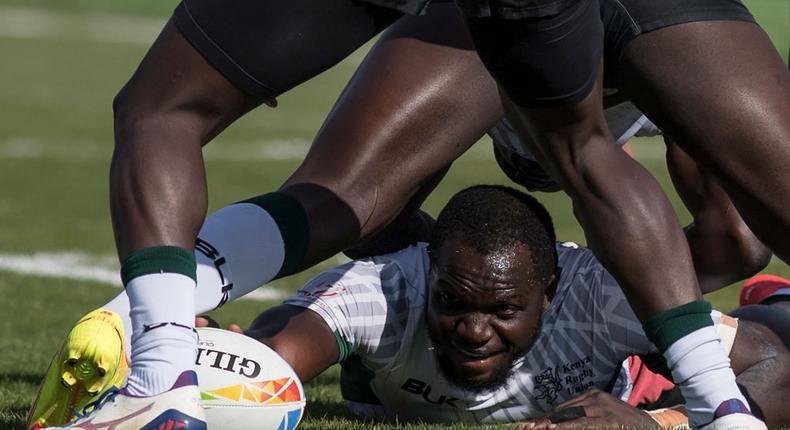 Kenya's Herman Humwa tries to save the ball during the Men's HSBC World Rugby Sevens Series 2022 match between France and Kenya at the Ciudad de Malaga stadium in Malaga, on January 22, 2022. (Photo by JORGE GUERRERO/AFP via Getty Images)