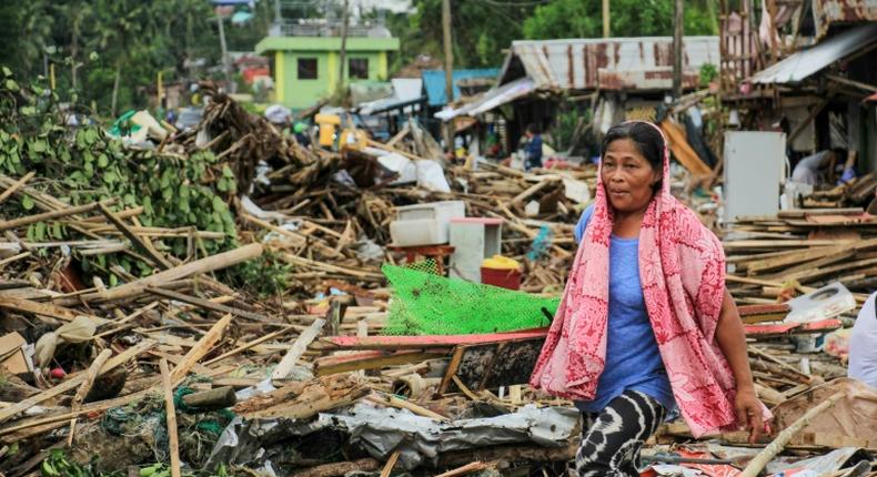 Kammuri's fierce winds toppled trees and flattened flimsy homes across a swathe of the nation's north on Tuesday